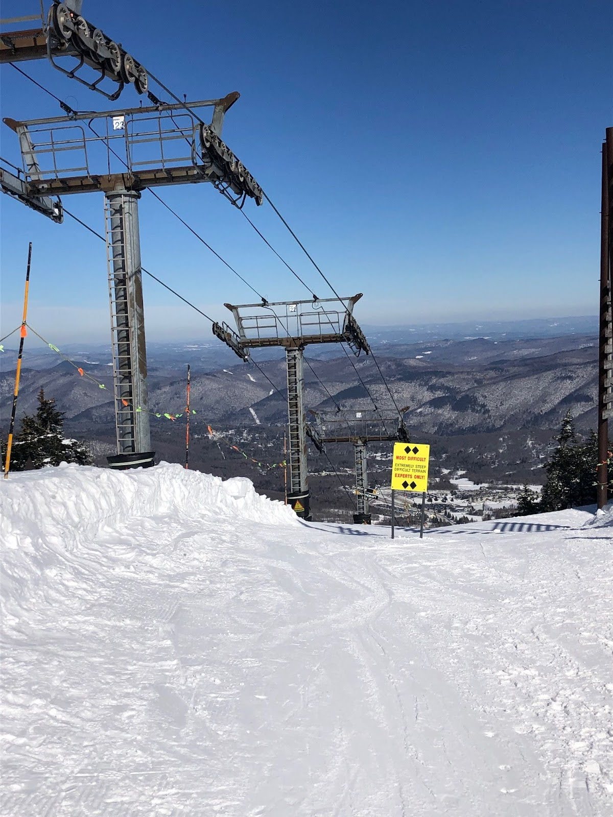View from the top of Killington’s K1 gondola with a double black diamond trail sign