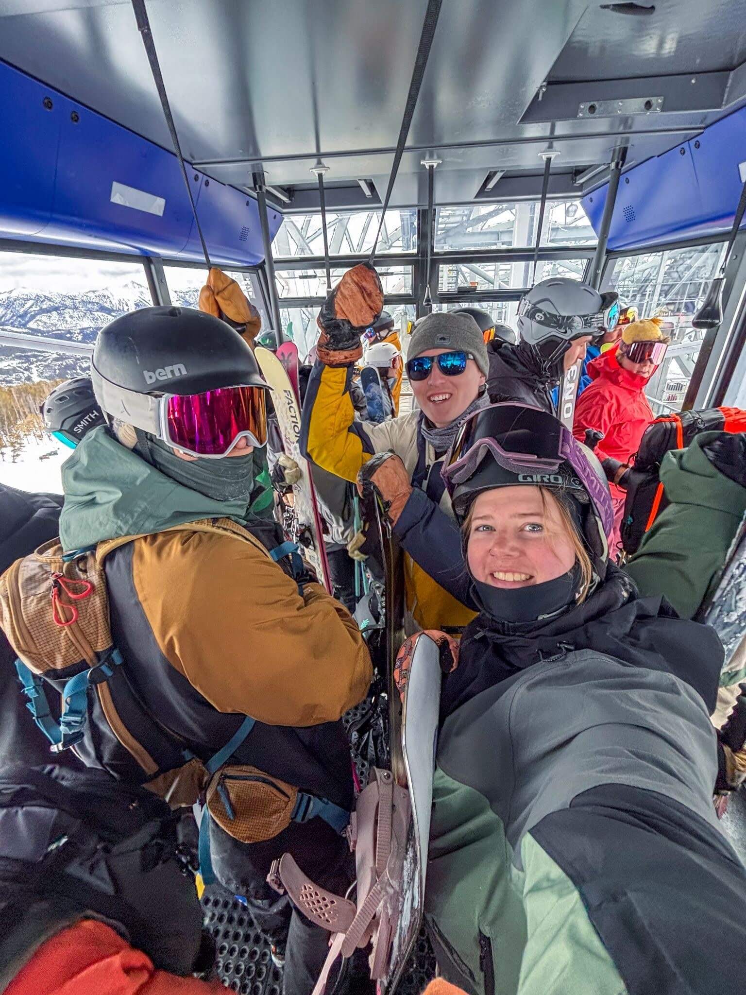 A group of skiers and snowboarders in the aerial tram at Big Sky, MT